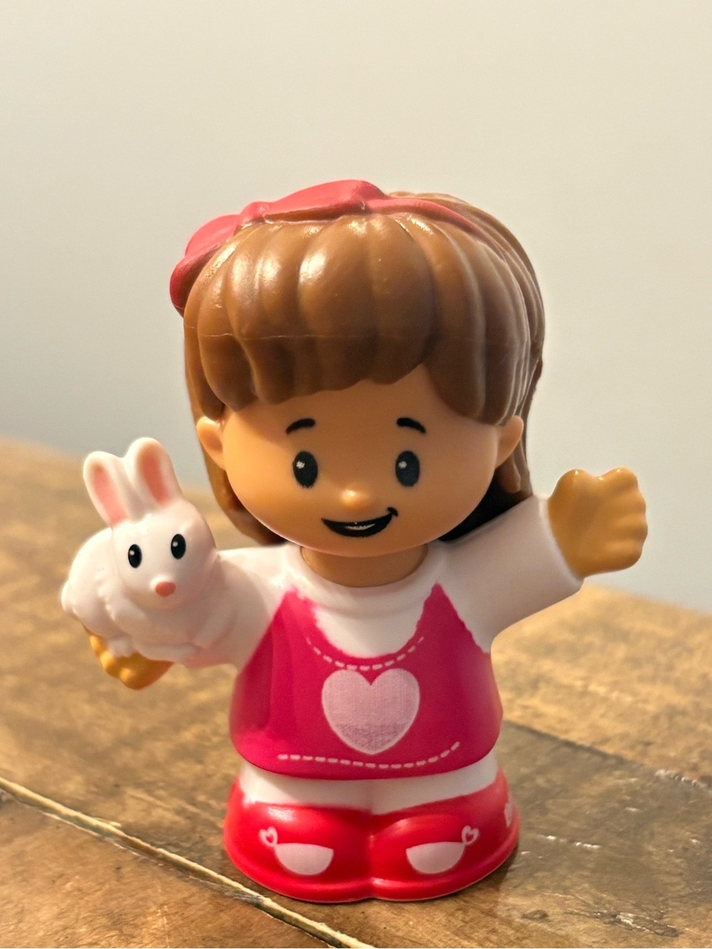 Little People Mia holding a White Bunny